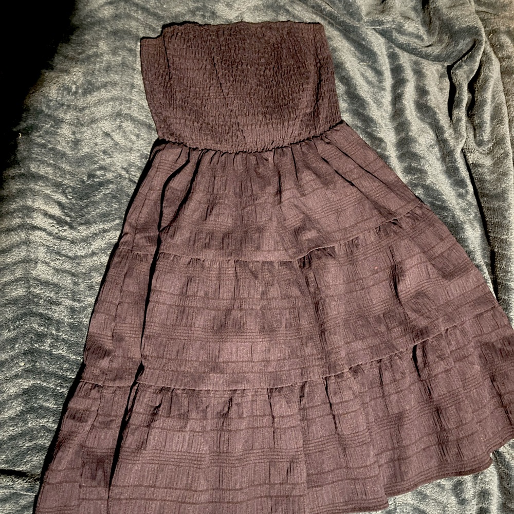 Navy blue strapless dress. It’s a dark navy blue but can’t see in picture well.